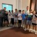 El equipo alevín de fútbol sala Ferri Peñaranda celebra su doble triunfo de este verano con una merienda de niños y padres